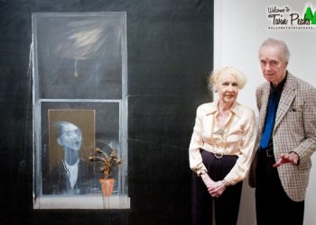 Rodger LaPelle and Christine McGinnis next to Woman in the Window by David Lynch