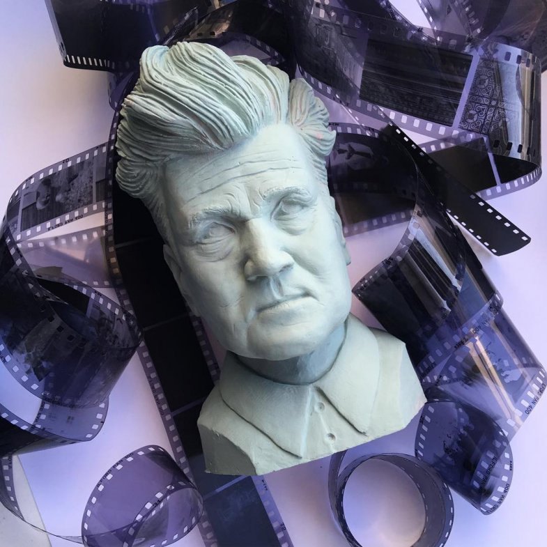 David Lynch bust with film rolls