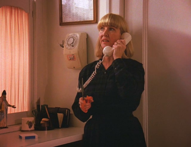 Betty Briggs on the telephone