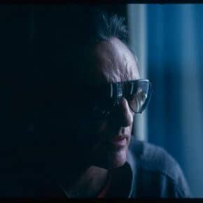Dennis Hopper wearing sunglasses