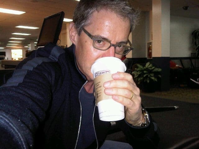 Kyle MacLachlan drinking coffee