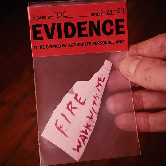 Fire Walk with Me sticker in a sealed evidence bag