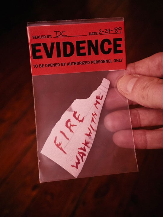 Fire Walk with Me sticker in a sealed evidence bag