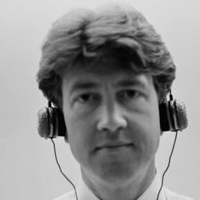 David Lynch wearing headphones