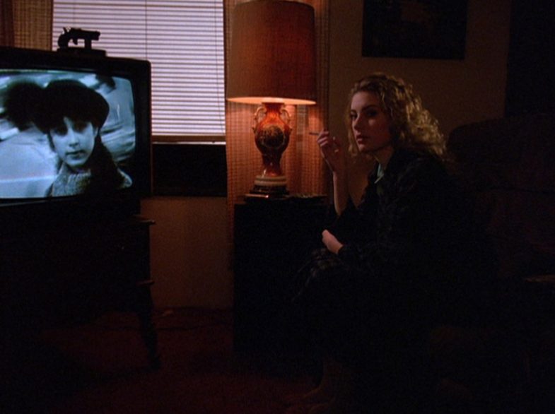 Shelly Johnson watching television